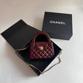 Bolsa Chanel Kelly Baby