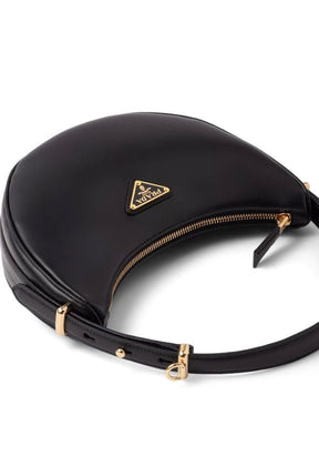 Prada Bolsa de ombro Arqué em couro